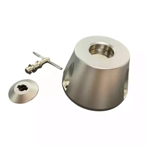 Base magnétique pour pohcettes anti-ondes et sa clé de sécurité.